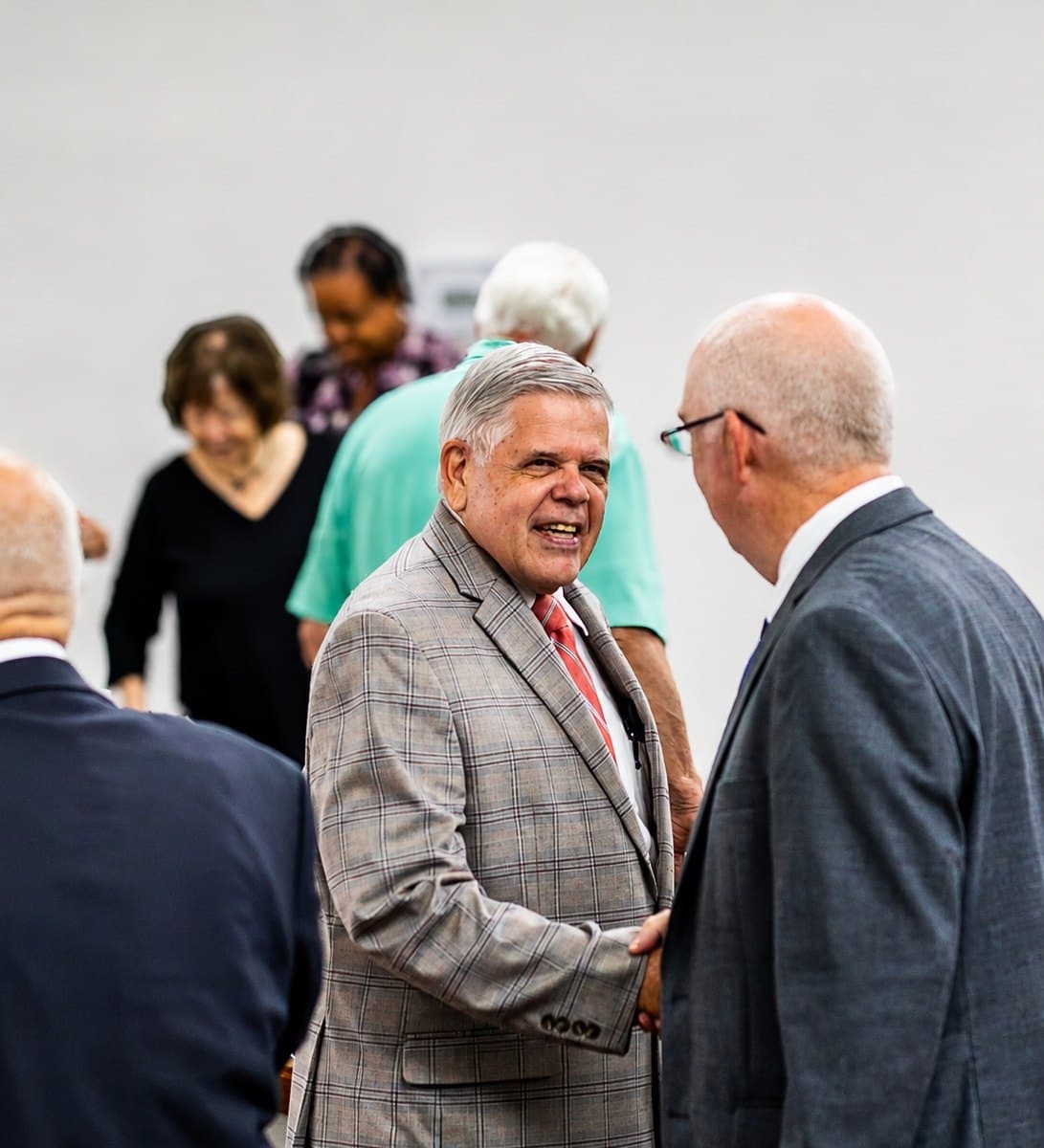 Two members talking together after a Sunday service